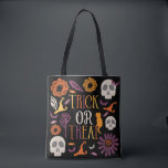 Trick or Treat Stylish Halloween Pattern Design Tote Bag<br><div class="desc">Trick or Treat? our cute and stylish halloween theme doormat design is perfect for trick or treating on Halloween Night . The design features our own hand-drawn flowers, skulls, bats, witch hat and cat designed around to create a fun halloween pattern with "Trick or Treat" typography displayed in the middle...</div>