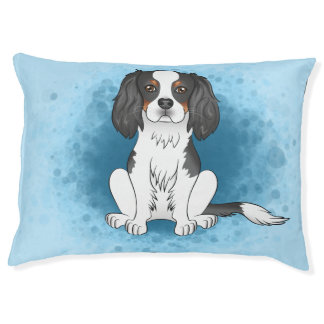 Tricolor Cavalier King Charles Spaniel Dog On Blue Pet Bed