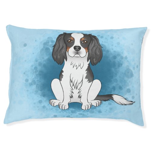 Tricolor Cavalier King Charles Spaniel Dog On Blue Pet Bed