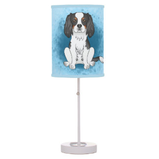 Tricolor Cavalier King Charles Spaniel Dog On Blue Table Lamp