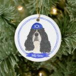 Tricolor English Springer Spaniel Hanukkah Ceramic Ornament<br><div class="desc">Celebrate your favorite mensch on a bench with a personalized ornament! This design features a sweet illustration of a tricolor english springer spaniel dog with a blue and white yarmulke. For the most thoughtful gifts, pair it with another item from my collection! To see more work and learn about this...</div>