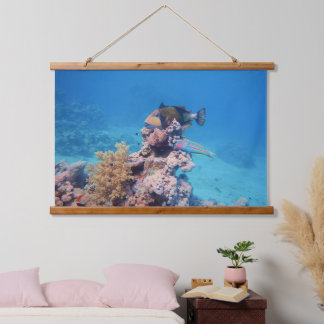 Triggerfish rests on a coral block at coral reef | hanging tapestry