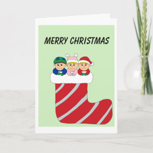 triplets in stocking colored holiday card