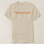TRIXIE Retro 70's Themed Burnt Orange Bridesmaid T-Shirt<br><div class="desc">This bridesmaid t shirt features a retro 70's themed font with a creamy orange coloring. This shirt makes the perfect gift for the entire wedding party. Just search the Trixie Collection to find all coordinating text. 💜 COLORS ARE EDITABLE!  Click 'edit design' to create your own colors.</div>