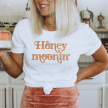 TRIXIE Retro 70's Themed Honeymoonin' Bride T-Shirt<br><div class="desc">This honeymoonin' bride t shirt features a retro 70's themed font with a creamy orange coloring. This shirt makes the perfect gift for a bride-to-be at her bridal shower or bachelorette weekend so she can wear it on her honeymoon. Colors are editable! Click 'edit design' to create your own colors....</div>