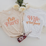 TRIXIE Retro Wife of the Party Bachelorette Group T-Shirt<br><div class="desc">This 'the party' bachelorette t shirt features a retro 70's themed font in blush and orange coloring. Order the white 'wife of the party' option for the bride-to-be and the coordinating orange 'the party' shirts for your bachelorette group. Colors are editable! Click 'edit design' to create your own colors.</div>