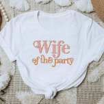 TRIXIE Retro Wife of the Party Bachelorette Group T-Shirt<br><div class="desc">This 'wife of the party' bachelorette t shirt features a retro 70's themed font in blush and orange coloring. Order the white 'wife of the party' option for the bride-to-be and the coordinating orange 'the party' shirts for your bachelorette group. Colors are editable! Click 'edit design' to create your own...</div>