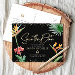 Tropical Bat Mitzvah Save Date Black Gold Floral Invitation Postcard<br><div class="desc">Make sure all your friends and relatives will be able to celebrate your daughter’s milestone Bat Mitzvah! Send out this chic, personalized “Save the Date” announcement postcard. Stylish, stunning, colorful, tropical watercolor birds of paradise flowers, faux gold handwritten script, Star of David and glitter dots, along with modern sans serif...</div>