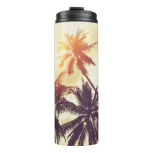 Tropical beach background with palm trees silhouet thermal tumbler
