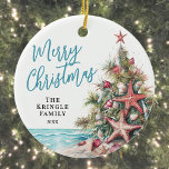 Tropical Beach Christmas Ceramic Ornament<br><div class="desc">Celebrate the season with this festive and beachy round Christmas ornament, perfect for a coastal holiday celebration. The design features a whimsical Christmas tree made of beach shells, starfish, and coral, with a mix of green, tan, and a pop of orange-red on the starfish at the top—bringing a fun tropical...</div>