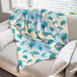 Tropical Beach Christmas Sea Turtle Fleece Blanket<br><div class="desc">When the weather outside is frightful, and you are dreaming of a nice warm sunny tropical beach, wrap yourself in this coastal themed Christmas sea turtle fleece blanket, featuring a pattern of cute turquoise blue sea turtles on an abstract beach background with a faux glitter wave and sparkly star accents....</div>