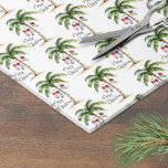 Tropical Beach Christmas Tissue Paper<br><div class="desc">Celebrate the season with this festive wrapping paper featuring a repeating pattern of a watercolor palm tree wrapped in colorful Christmas lights. Three holiday stockings hang playfully from the fronds, with soft beach sand at the base, creating a warm and tropical holiday look. “Merry Christmas” is included throughout the design...</div>