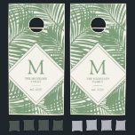 Tropical Beach Family Name Monogram Palm Pattern  Cornhole Set<br><div class="desc">Modern Tropical Beach House Monogrammed Family Name Corn Hole Boards in Sage Green and off-white palm tree leaf pattern. This customized Beanbag Toss Game Board Set is custom printed with your Family Name and initial. The overlapping leaf pattern is perfect for a contemporary beach or lake house or tropical-inspired backyard....</div>