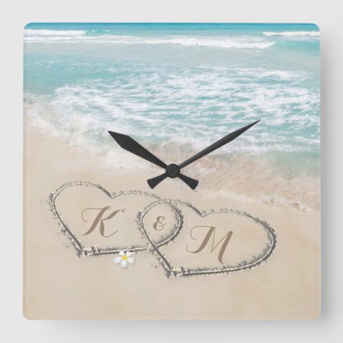 Tropical Beach Heart Shore Monogram Square Wall Clock - Beach themed couples clock featuring a summer vintage sandy beach, blue sea with two hearts in the shoreline, and your initials.