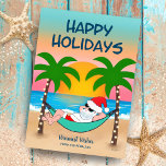 Tropical Beach Santa Hammock Palm Tree Christmas Holiday Card<br><div class="desc">Send your warmest holiday wishes with this tropical theme Christmas card featuring Santa on vacation relaxing in a hammock on the beach,  enjoying the ocean waves,  colorful sunset and festive palm trees decked out in string lights.  Original artwork KL Stock.</div>