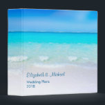 Tropical Beach with a Turquoise Sea Wedding Plans 3 Ring Binder<br><div class="desc">A binder personalized with your info such as Wedding Plans,  travel plans or whatever suits your needs. Designed with a scenic tropical beach. A gorgeous turquoise sea in the distance and crystal clear waters caressing a sandy beach. A bright blue sky in the background.</div>