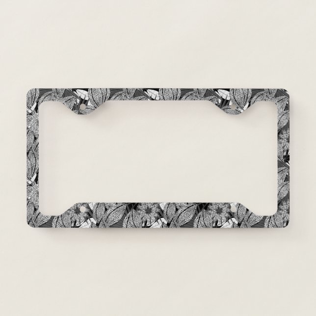 Tropical black and white spotted flowers license plate frame (Front)