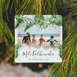 Tropical Botanical Mele Kalikimaka Christmas Photo Ceramic Ornament<br><div class="desc">Hawaiian style Christmas Ornament with lush botanical tropical watercolor greenery and faux gold accents. Featuring your favorite photograph cascaded with tropical foliage and gold florals,  the Hawaiian Christmas greeting 'Mele Kalikimaka' in elegant calligraphy script typography,  family name and the year.</div>