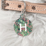 Tropical Botanical Monogram Pet ID Tag<br><div class="desc">Tropical chic ID tag for your furbaby features a single initial monogram in crisp white,  on a pattern of green botanical jungle leaves on a vibrant coral pink background. Personalize with your pet's name and your contact details on the reverse side.</div>