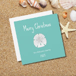 Tropical Christmas Beach Sand Dollar Teal Holiday Card<br><div class="desc">Tropical Beach Christmas teal green greeting card,  with a sand dollar and white typography design,  With customizable lettering,  you can add your own Information. Great for sending well wishes to loved ones this holiday season.</div>