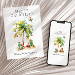 Tropical Christmas Flat Holiday Card<br><div class="desc">Switch up the traditional Christmas spirit with our Tropical Christmas card. Ideal for those celebrating festivities under the sun, it features a vibrant palm tree adorned with coloured baubles, gifts scattered along the sandy beach, while a playful parrot sporting a Santa hat frolics in the scene. For those fortunate to...</div>