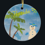 Tropical Christmas in Florida Snowman on Beach Ceramic Ornament<br><div class="desc">Merry Florida Christmas! Celebrate the joys of being in a warm-weather State for the holidays. You'll surely be the envy of all your cold-climate friends! This tropical-themed Christmas Ornament features a snowman on the beach, tropical attire including a bathing suit swaying in the balmy coastal breeze as it hangs from...</div>