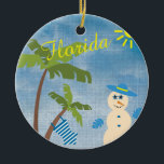 Tropical Christmas in Florida Snowman on Beach Ceramic Ornament<br><div class="desc">Merry Florida Christmas! Celebrate the joys of being in a warm-weather State for the holidays. You'll surely be the envy of all your cold-climate friends! This tropical-themed Christmas Ornament features a snowman on the beach, tropical attire including a bathing suit swaying in the balmy coastal breeze as it hangs from...</div>