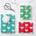 Tropical Christmas in July palm tree pattern Wrapping Paper Sheets<br><div class="desc">Tropical Christmas in July palm tree pattern Wrapping Paper Sheets. Modern summer Holiday print gift wrap for friends and family. Palm designs for kids and adults. Customizable teal,  red and green background colors. Matte or glossy finish. Merry Christmas!</div>