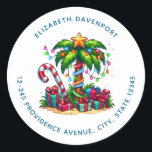 Tropical Christmas Palm Tree Address Classic Round Sticker<br><div class="desc">Address stickers with a seasonal holiday image. A tropical palm tree decorated in festive lights with a star on top. A giant red and white candy cane sticking out of the sand. Christmas presents under the tree. Whimsical and fun.</div>