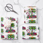 Tropical Christmas Palm Tree Pattern Wrapping Paper Sheets<br><div class="desc">Wrapping paper sheets with a seasonal holiday image. A tropical palm tree decorated in festive lights with a star on top. A giant red and white candy cane sticking out of the sand. Christmas presents under the tree. Whimsical and fun.</div>
