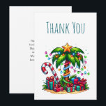Tropical Christmas Palm Tree Thank You Card<br><div class="desc">Thank you card with a seasonal holiday image. A tropical palm tree decorated in festive lights with a star on top. A giant red and white candy cane sticking out of the sand. Christmas presents under the tree. Whimsical and fun.</div>