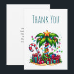 Tropical Christmas Palm Tree Thank You Card<br><div class="desc">Thank you card with a seasonal holiday image. A tropical palm tree decorated in festive lights with a star on top. A giant red and white candy cane sticking out of the sand. Christmas presents under the tree. Whimsical and fun.</div>