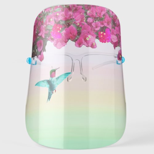 Tropical flowers and hummingbird on pastel colors face shield