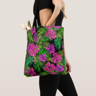 Tropical flowers and plants on black  tote bag