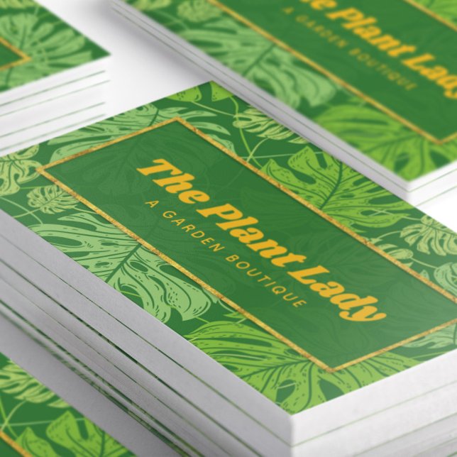 Tropical Green and Gold Monstera Palm Leaves Business Card (Close up stacked Tropical Green and Gold Monstera Palm Leaves Business Cards)