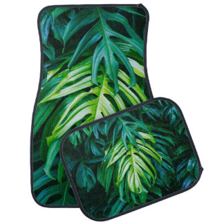 Tropical green leaves on dark background, nature s car floor mat