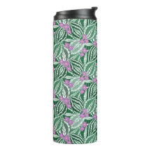 Tropical green leaves with purple flower 