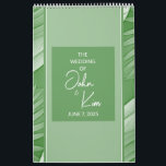 Tropical Green Wedding Calendar Planner<br><div class="desc">Planning a wedding? This tropical themed wedding calendar planner can help. Features green color hues trimmed with tropical leaves offering a fun yet classic look. The inside includes a "Things to do" section you can use to help you plan for your special occasion. Use the template to personalize.</div>