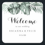 Tropical Greenery White Floral Wedding Welcome Square Sticker<br><div class="desc">This tropical greenery white floral wedding welcome square sticker is perfect for a rustic wedding. The design features green palm leaves bouquets with white lovely flowers. 

These labels are perfect for hotel guest welcome bags and destination weddings.</div>