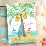 Tropical Island Beach Santa Mermaid Christmas Holiday Card<br><div class="desc">Beach theme "warm wishes" flat Christmas card features a tropical island, surfboard and seashells with a palm tree decked out in string lights. Santa is taking a break from surfing and is playing in the ocean, drinking from a pineapple and throwing the Hawaiian aloha hang loose shaka sign with a...</div>