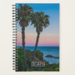 Tropical Island Paradise Sunset Personalized Name Planner<br><div class="desc">This design features a tropical island with palm trees and a calm sea with the sun setting and a editable personalized name written in popular modern typography. Personalize by editing the text in the text box or delete for no text.
#tropical #sunset #beach #ocean #personalized #planner #gift</div>