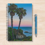 Tropical Island Paradise Sunset Personalized Name Planner<br><div class="desc">This design features a tropical island with palm trees and a calm sea with the sun setting and a editable personalized name written in popular modern typography. Personalize by editing the text in the text box or delete for no text.
#tropical #sunset #beach #ocean #personalized #planner #gift</div>