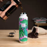Tropical Island Vibes Monogram Water Bottle<br><div class="desc">This customizable insulated bottle features a beautiful pattern of colorful, tropical foliage in shades of pink, teal and green. Great for keeping those summertime drinks cold, or for keeping a tropical feel through those cold, winter months! Makes a great gift! Font styles, and colors can easily be changed by clicking...</div>