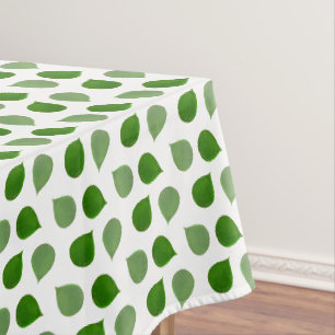 Tropical Jade Tree Green Leaves on White Tablecloth