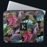 Tropical Jungle Foliage Botanical Pattern Laptop Sleeve<br><div class="desc">Lush foliage in bright watercolor shades of blue,  fuchsia,  purple and green form a vibrant free-form pattern in this tropical design. The black background may be changed to any other color by choosing "customize it" and selecting a different background color. Edit the sample monogram with your initial.</div>