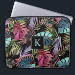 Tropical Jungle Foliage Botanical Pattern Laptop Sleeve<br><div class="desc">Lush foliage in bright watercolor shades of blue,  fuchsia,  purple and green form a vibrant free-form pattern in this tropical design. The black background may be changed to any other color by choosing "customize it" and selecting a different background color. Edit the sample monogram with your initial.</div>
