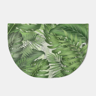Tropical jungle leaves: seamless floral background doormat