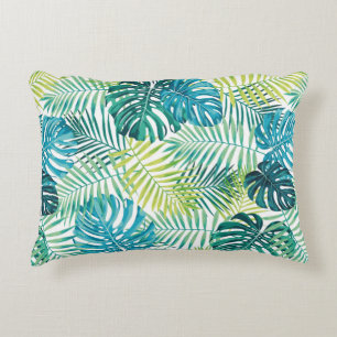 Tropical leaf design featuring green/blue palm and accent pillow