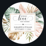 Tropical Leaf Spread Love Not Germs Hand Sanitizer Classic Round Sticker<br><div class="desc">Modern and elegant design printed Black Calligraphy Tropical Leaves Frame Spread Love Not Germs Hand Sanitizer Stickers that can be customized with your text. Personalize it with your couple name and your date! Please click the "Customize it" button and use our design tool to modify this template. Check out the...</div>