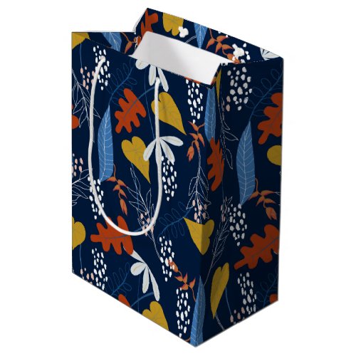 Tropical leaves and flowers pattern medium gift bag